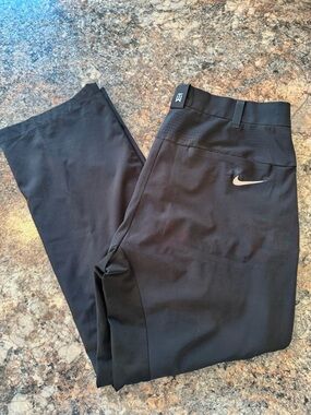 Men's Nike golf pants from the Tiger Woods Collection.